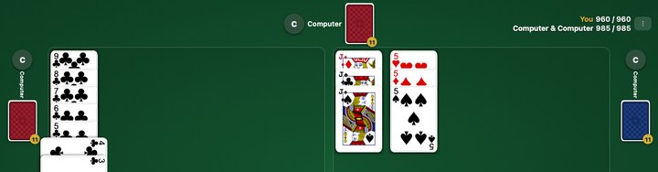 Un marcador ajustado a fin de partida, 960 a 985, con el mazo casi agotado.